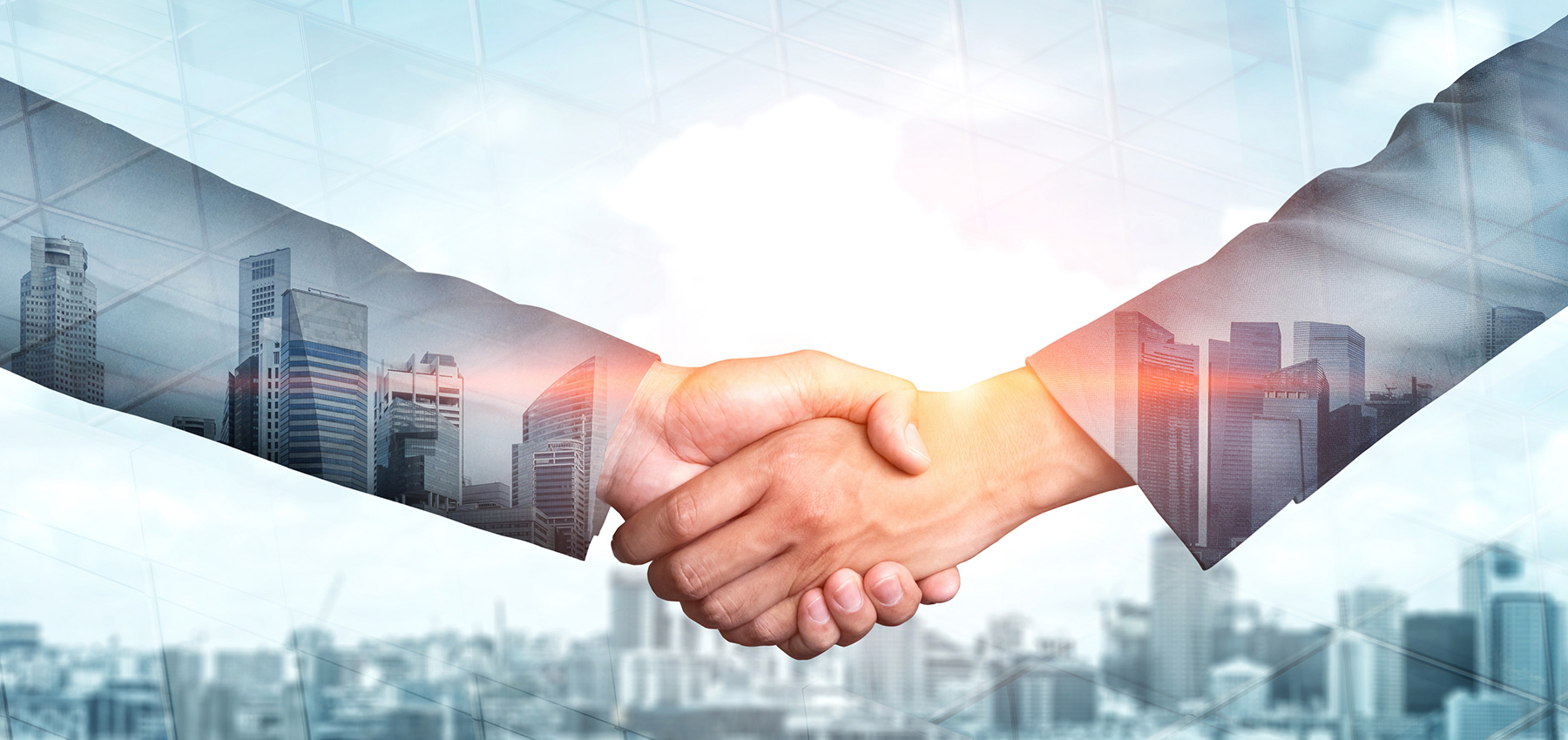 Un apretón de manos representa la colaboración entre empresas
